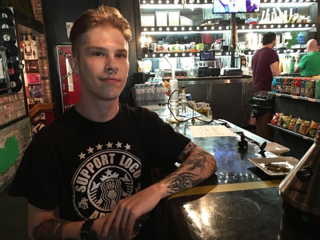 Jonah Komon is a 24-year-old with a medical marijuana license. He says there aren't many safe places to use the drug and taking away cannabis lounges will only make things worse. (Jason Viau/CBC)