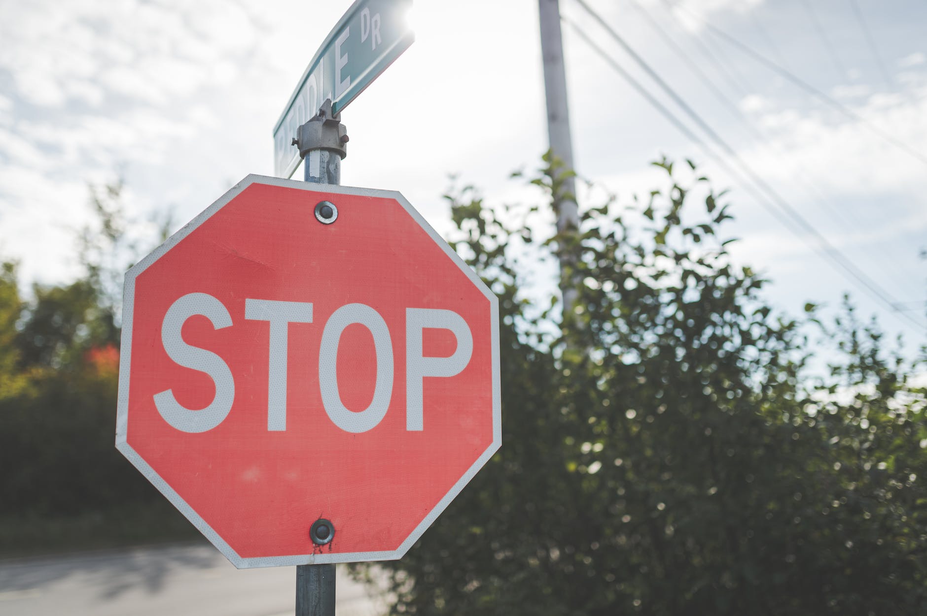 close up photo of a stop sign (Photo by Stephen Andrews)